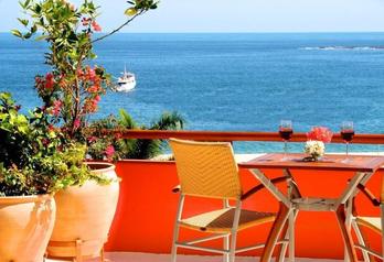 View of Chahué Bay from rooftop garden terrace at penthouse condo in Huatulco.